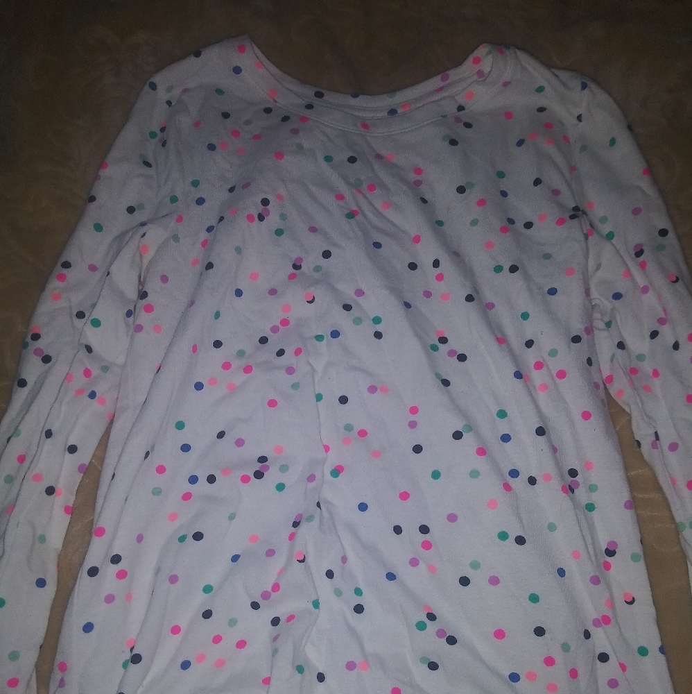 white polka dotted shirt